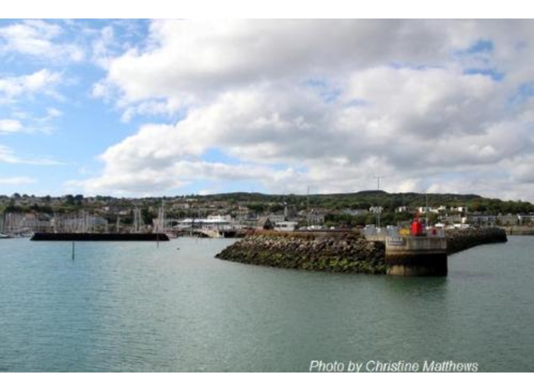 Howth Harbour central Pier. Yachts to the left of the poles (SHMs) and trawlers to the right of pierand out of shot.