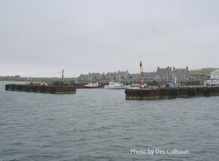 Entrance to Westray Marina showing the pontoons inside