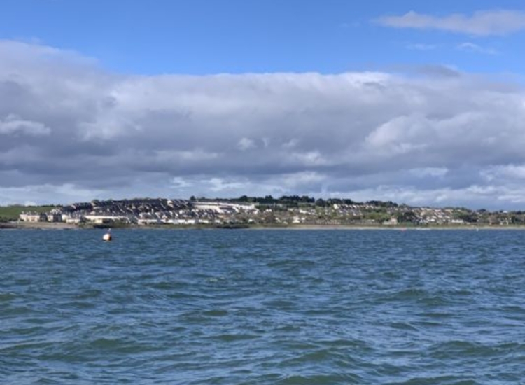 Safe water mark and channel entrance marks as viewed from a position approximately ENE of the entrance