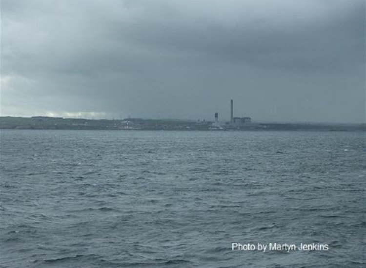 Boddam Power Station with Buchan Ness Lighthouse (red & white striped) to the left