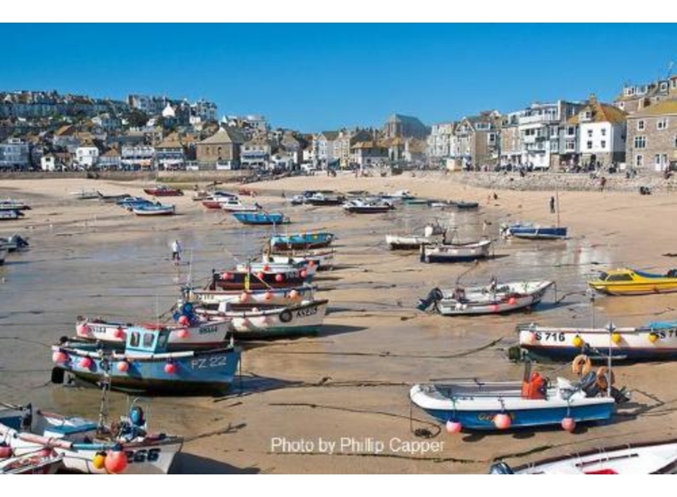 St Ives. looking along the harbour beach from Smeaton Pier