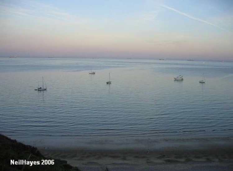 Anchorage Whitecliff Bay, note Shipping in and out of the Solent in background.